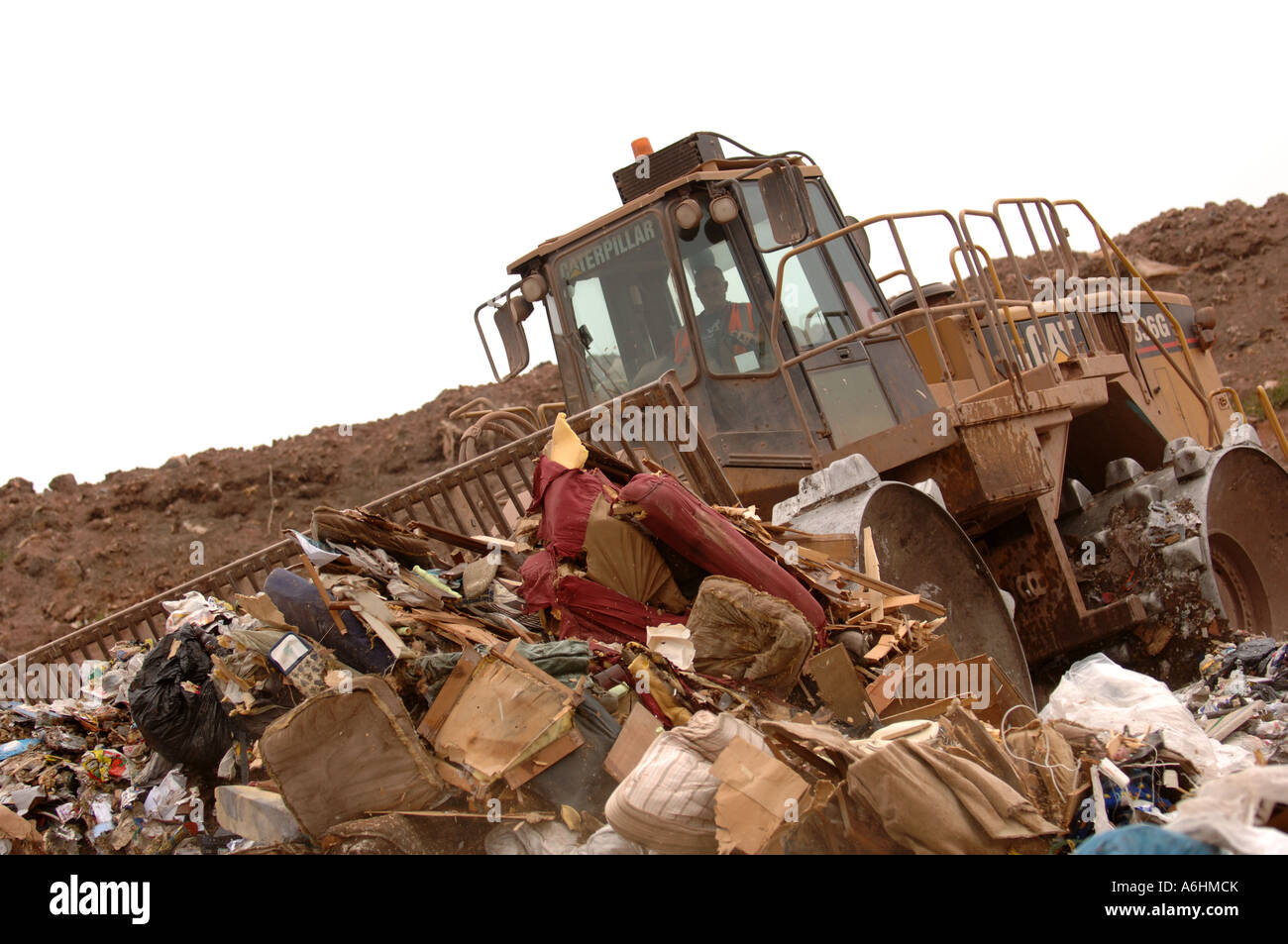 Compactor working on a landfill site Stock Photo Alamy