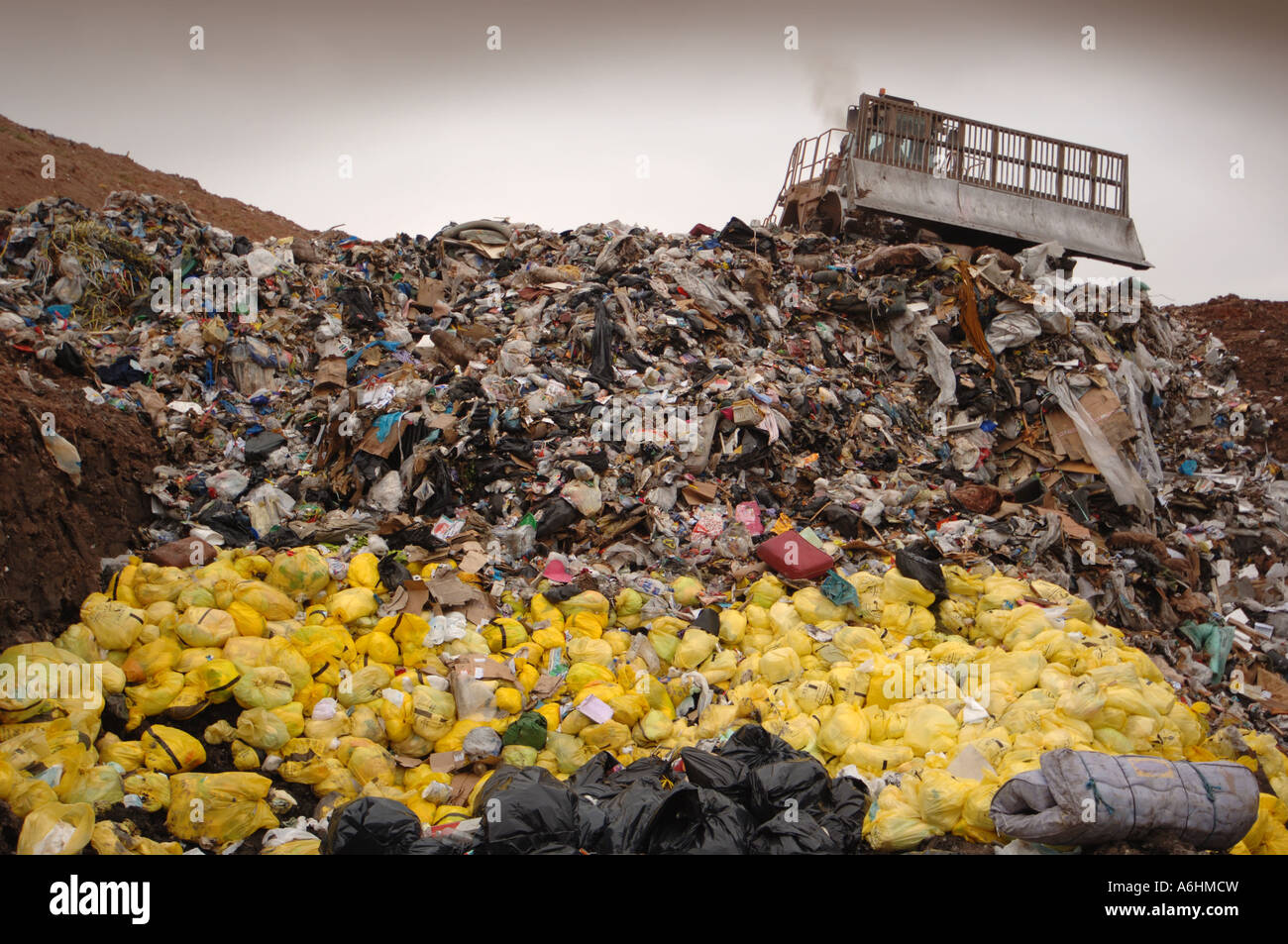 Compactor working on a landfill site Stock Photo Alamy