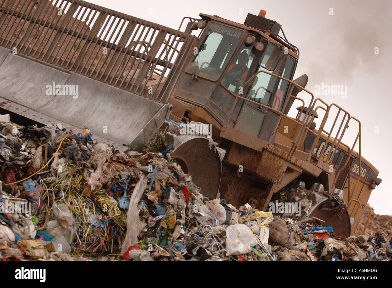 Compactor working on a landfill site Stock Photo Alamy