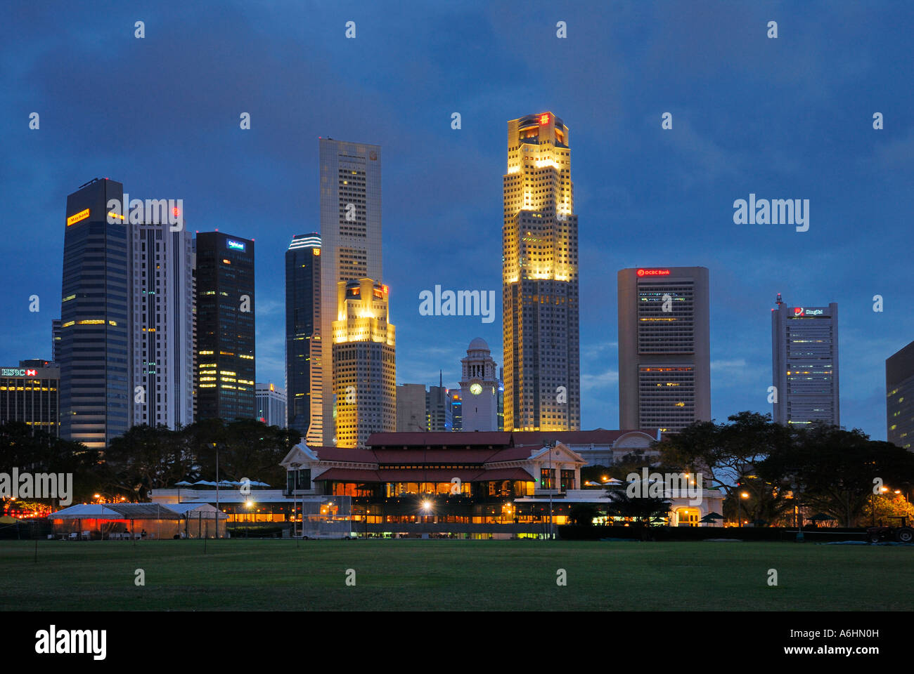 Singapore Cricket Club with Skyline at Dusk, Republic of Singapore, Asia Stock Photo