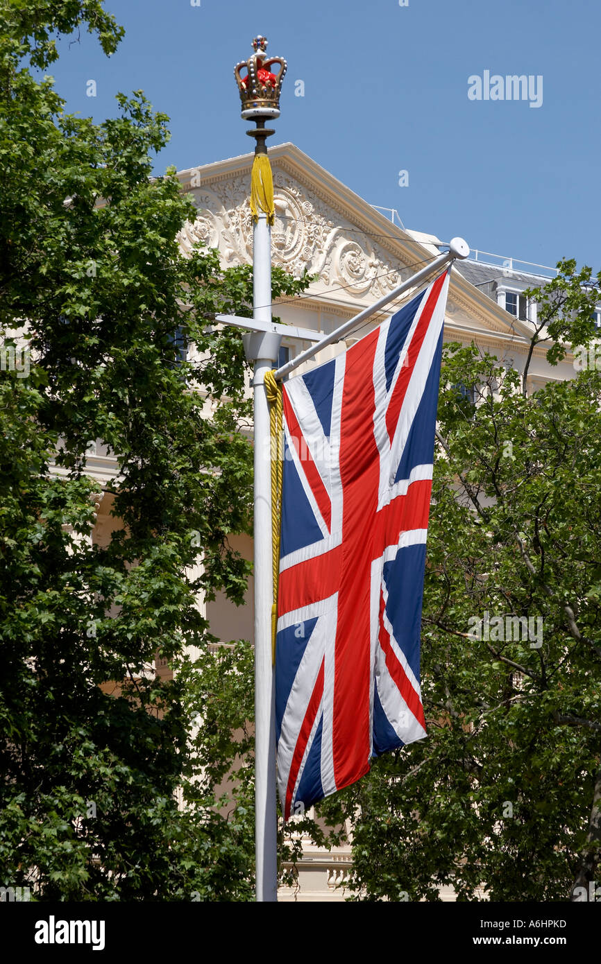 Union Jack flag on the Mall with plane trees and Carlton House Terrace