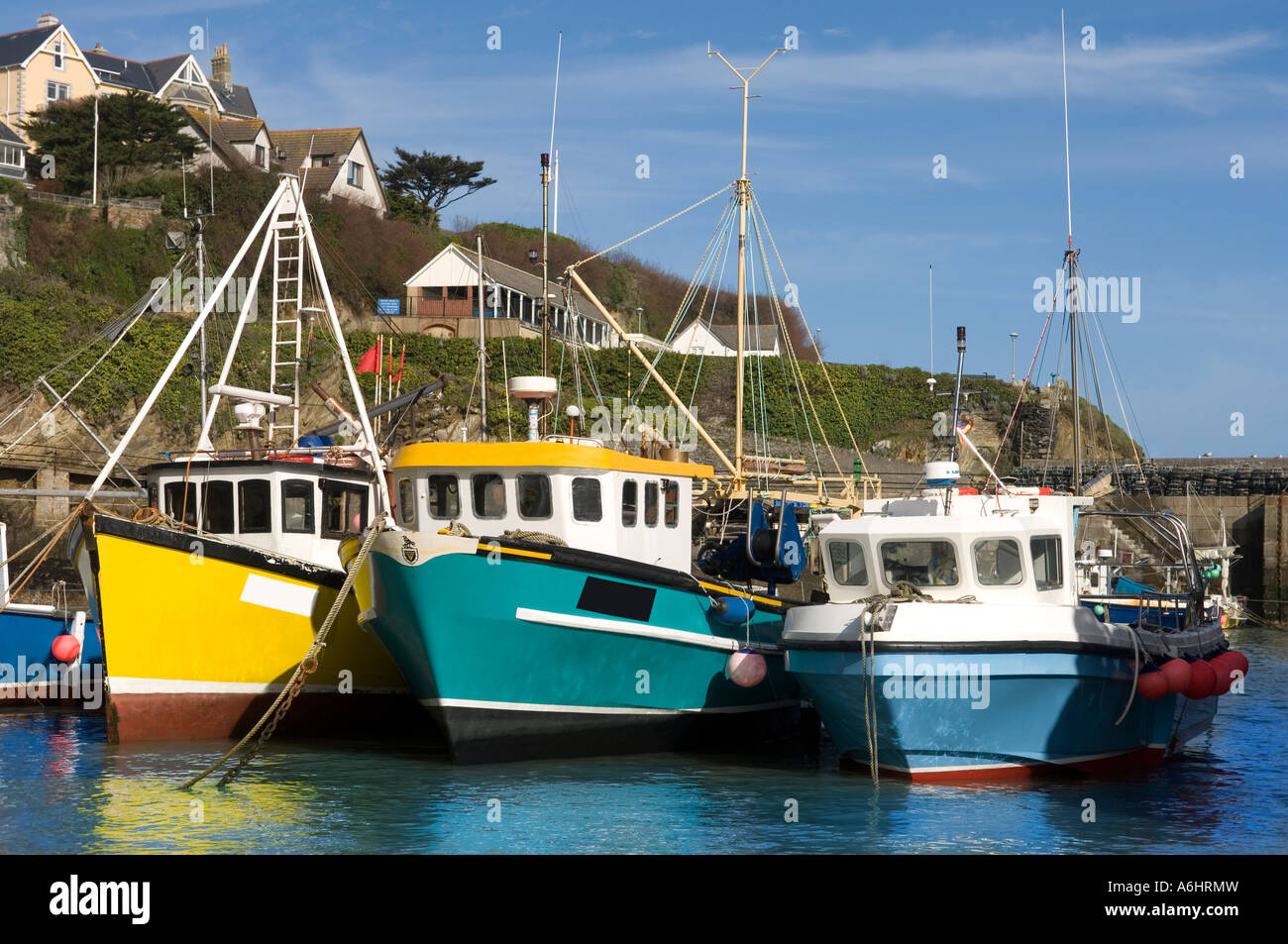 Coloured fishing trawlers hi-res stock photography and images - Alamy