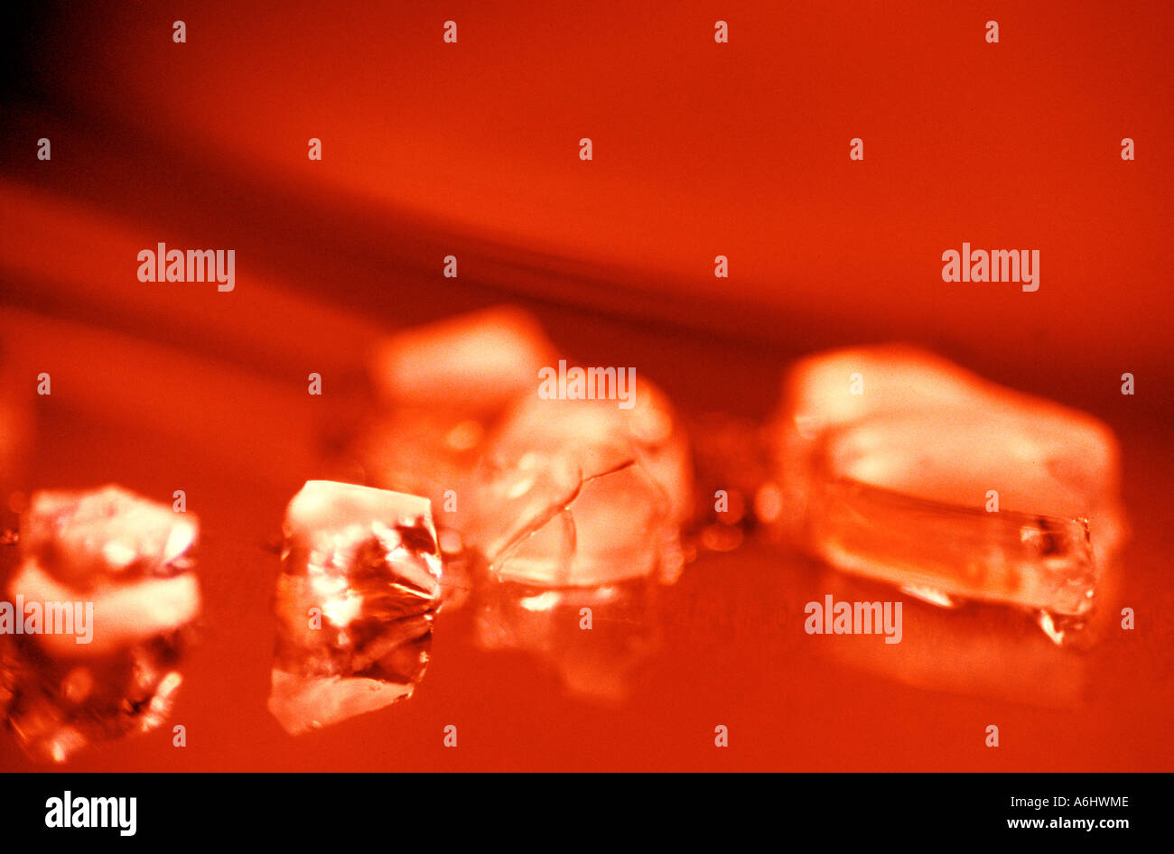 ice fragments on red background Stock Photo