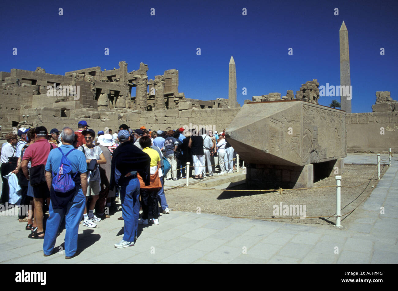 Group of tourists visiting the ancient town of Thebes now known as ...
