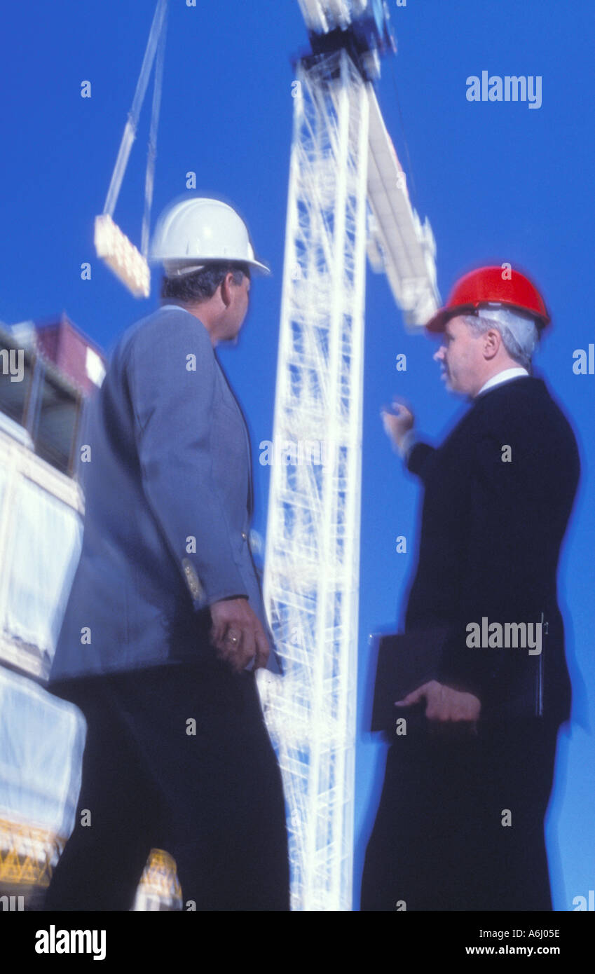 Men in Hard Hats Talking Stock Photo - Alamy