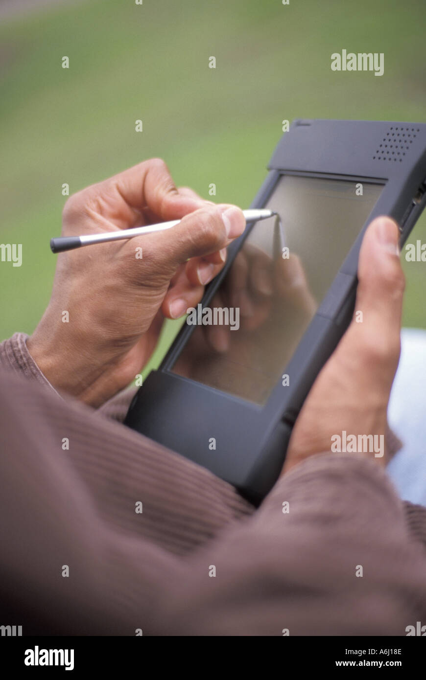 Using a PDA Stock Photo - Alamy