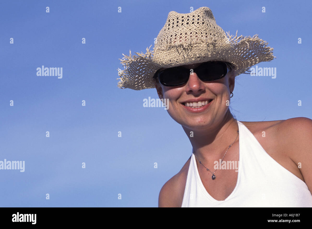 Woman Wearing Straw Hat and Sunglasses Stock Photo - Alamy