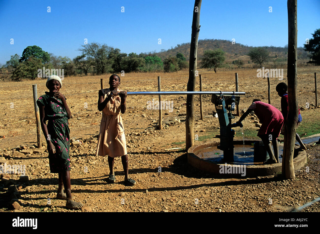 extracting clean water using a Water pump from a bore hole zimbabwe