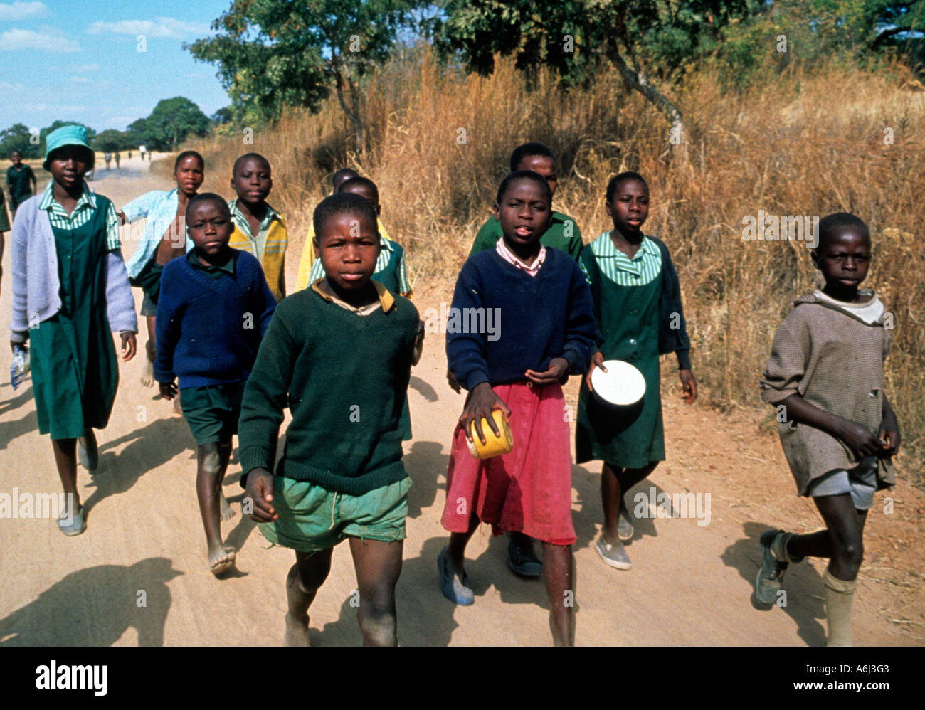 Schoolchildren walking to school zimbabwe Stock Photo
