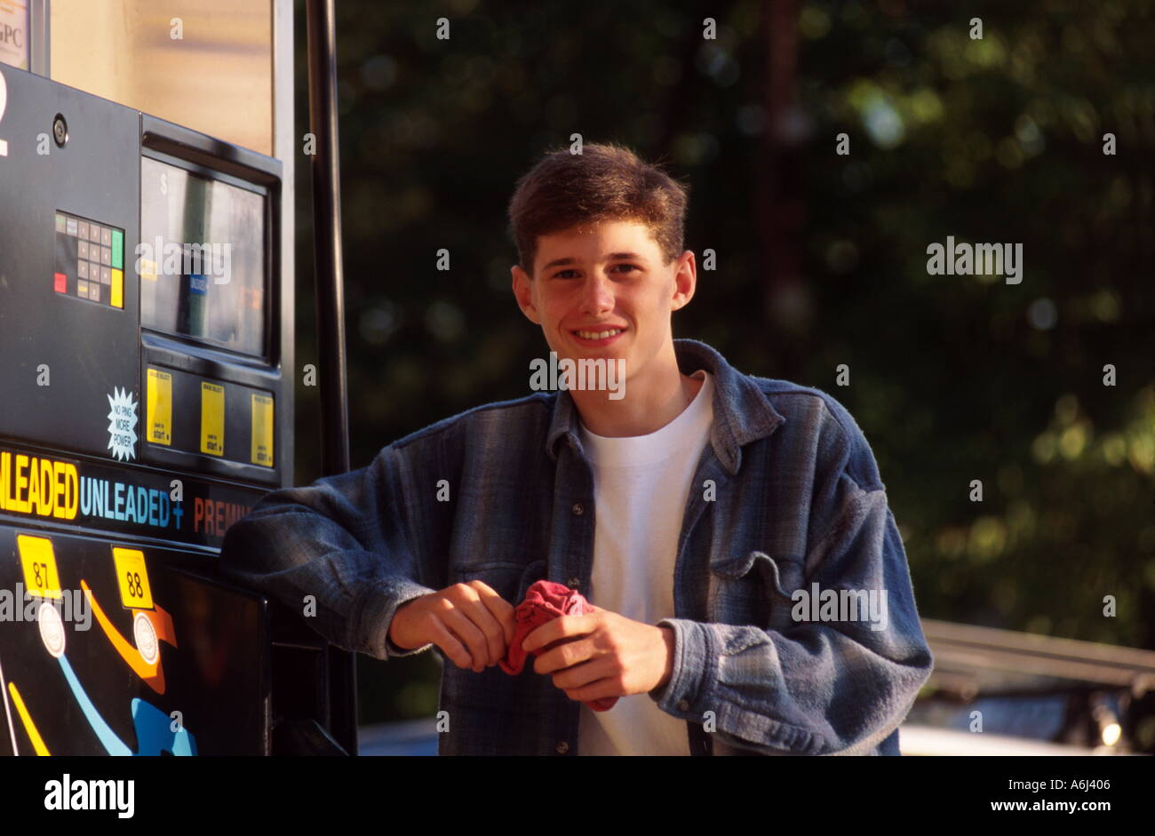 Teen Gas Station Attendant Stock Photo