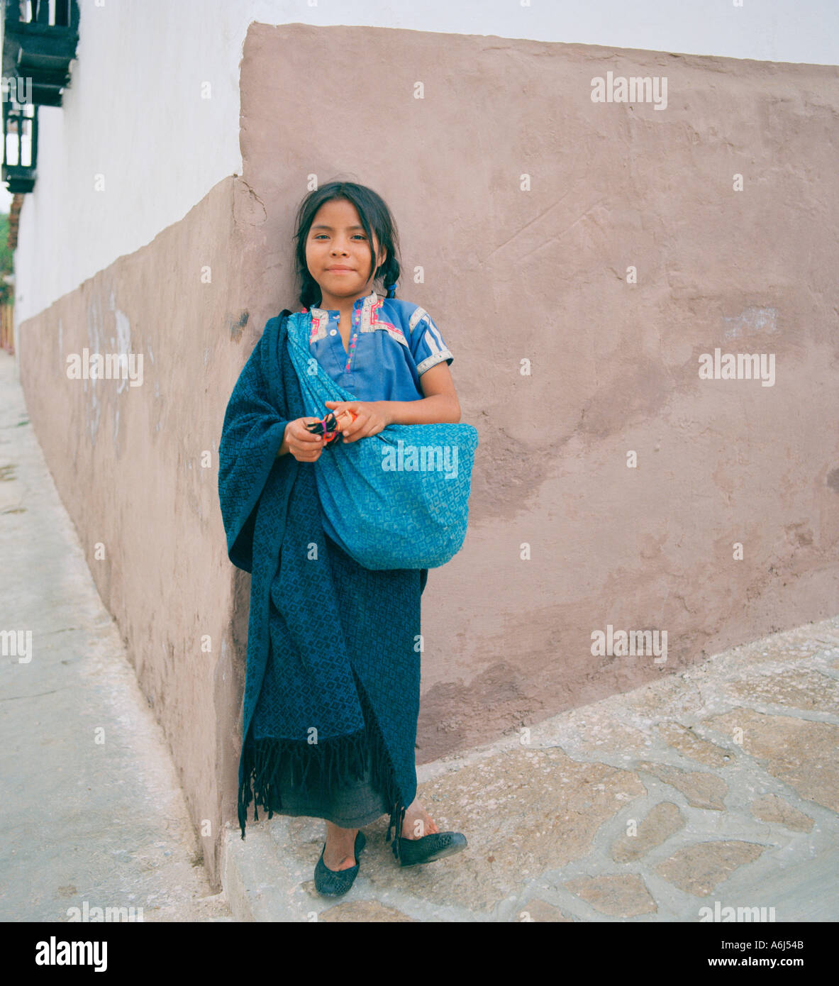 Native Indian girl on  a street in San Cristobal De Las Casas in Chiapas in Mexico in Latin Central America. People Portrait Reportage Travel Stock Photo