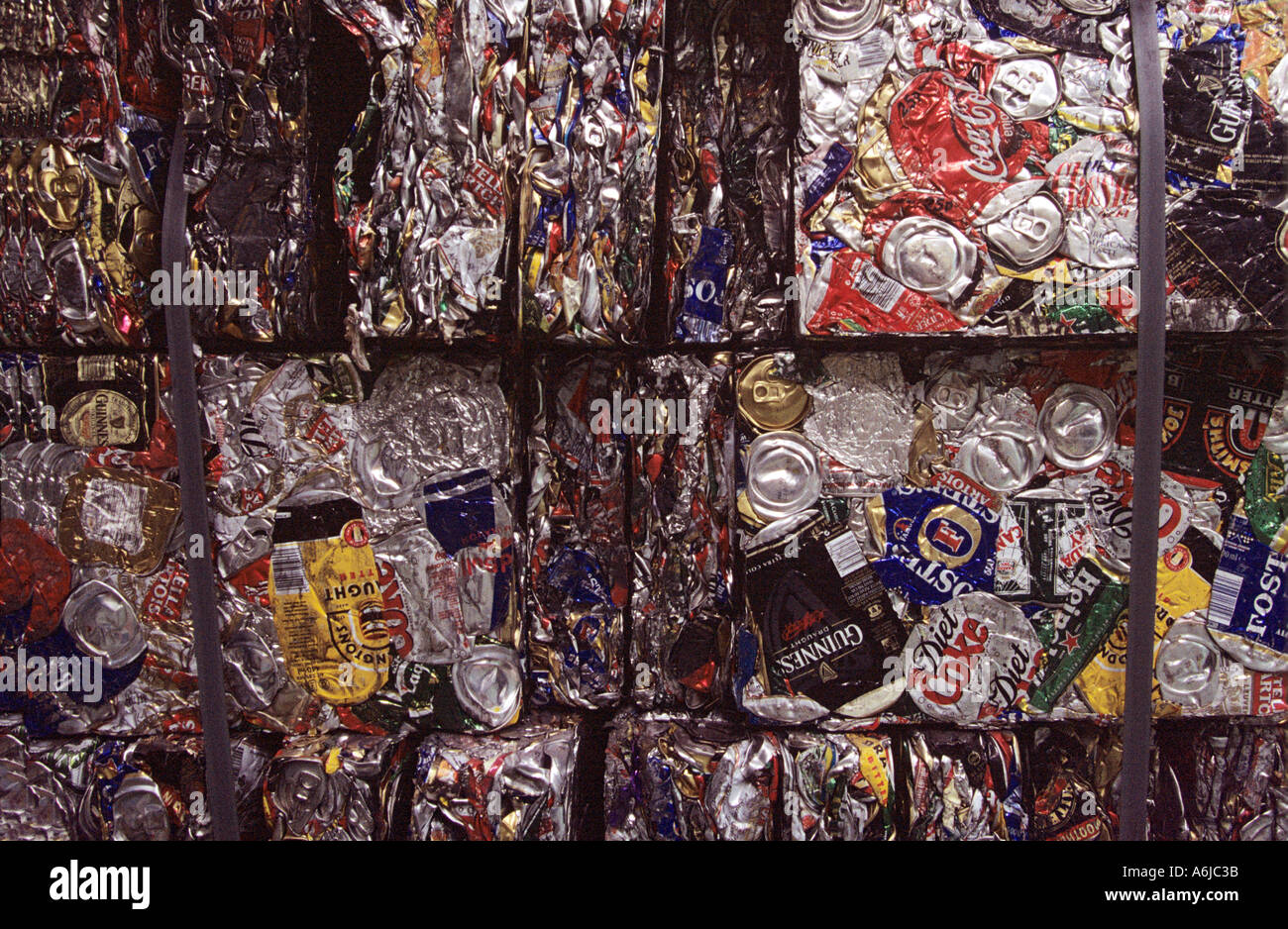 Aluminium cans crushed flattened and stacked ready for recycling and
