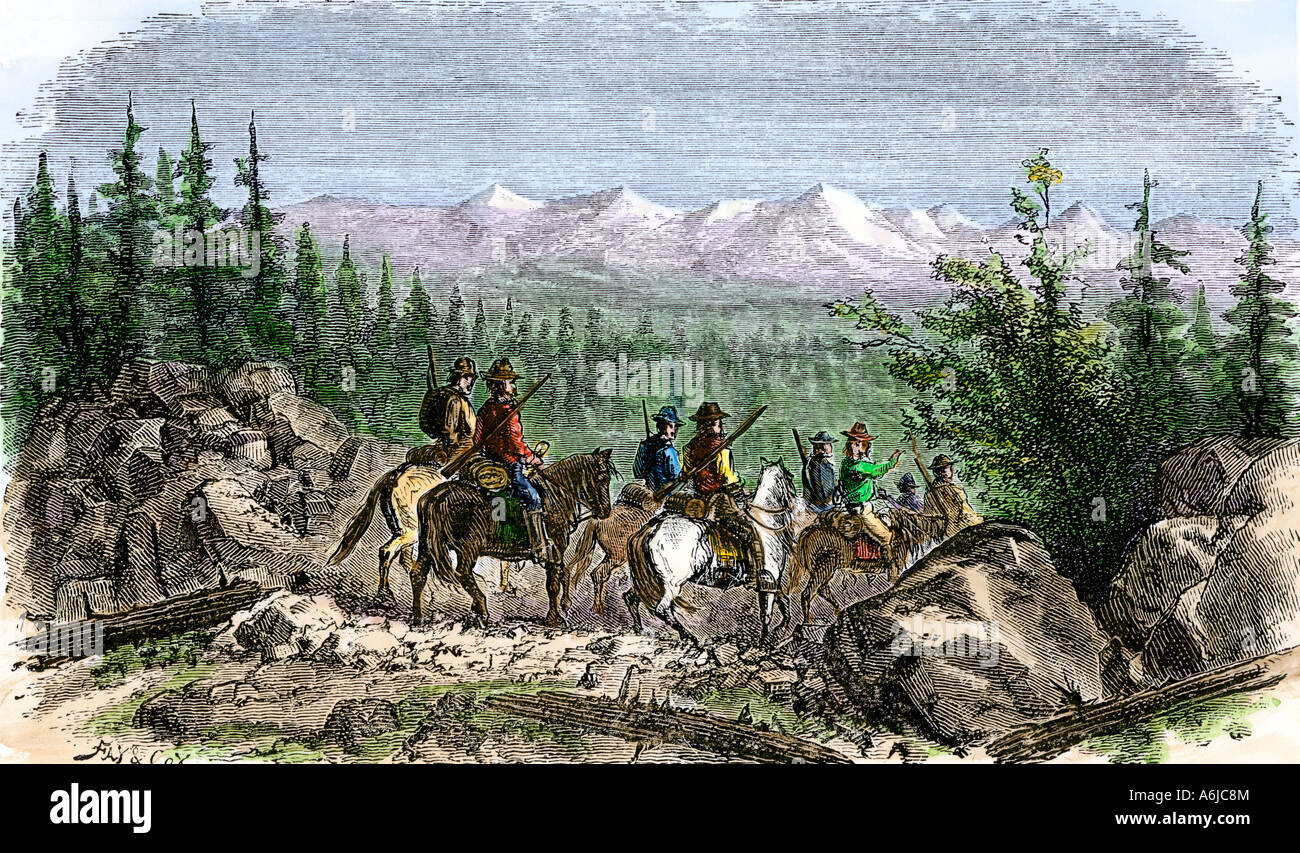 Group of pioneer horsemen getting their first glimpse of the Sierra Nevada range 1800s. Hand-colored woodcut Stock Photo