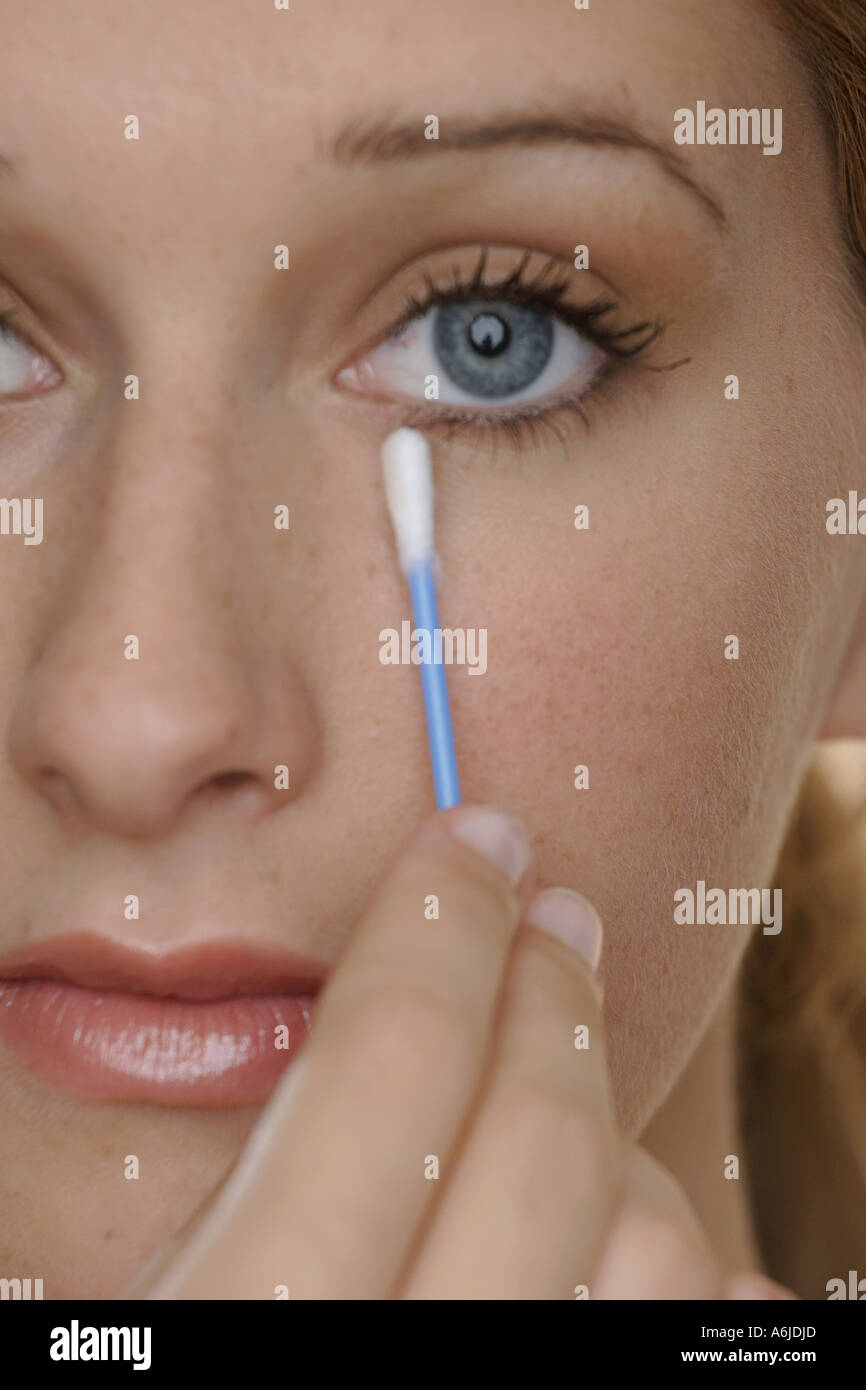 Woman cotton bud eye hires stock photography and images Alamy