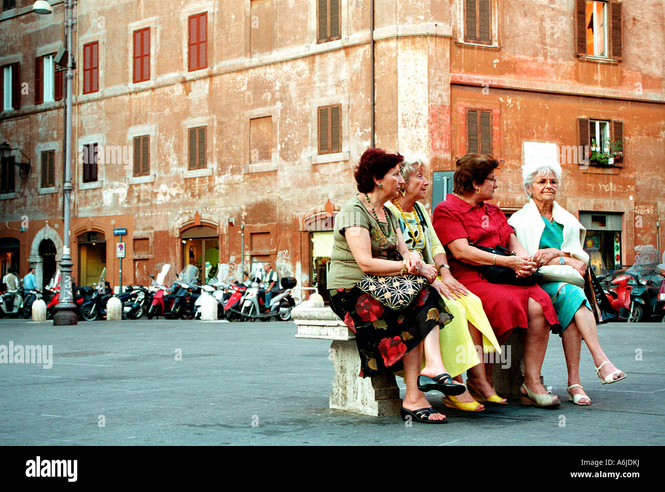 Elderly women sitting on a bench, Rome, Italy Stock Photo