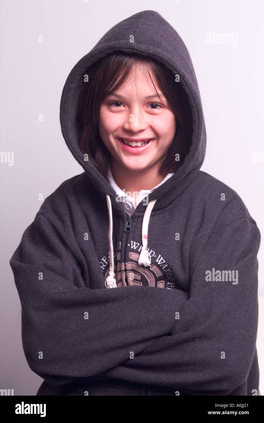 Handsome young 12 year old boy wearing a hoodie Stock Photo Alamy