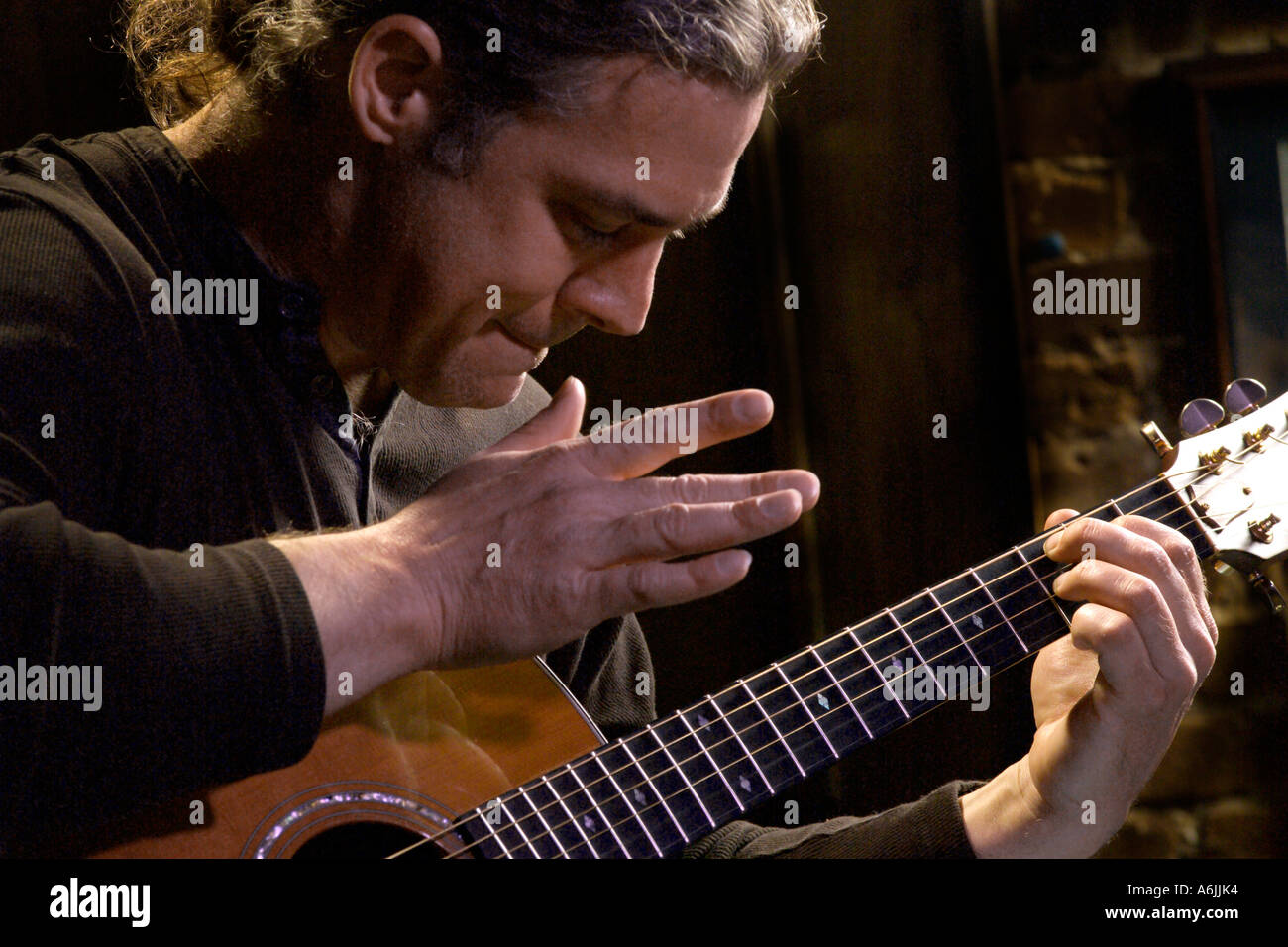 Long Haired Male Musician Playing Guitar Stock Photo 6623155 Alamy