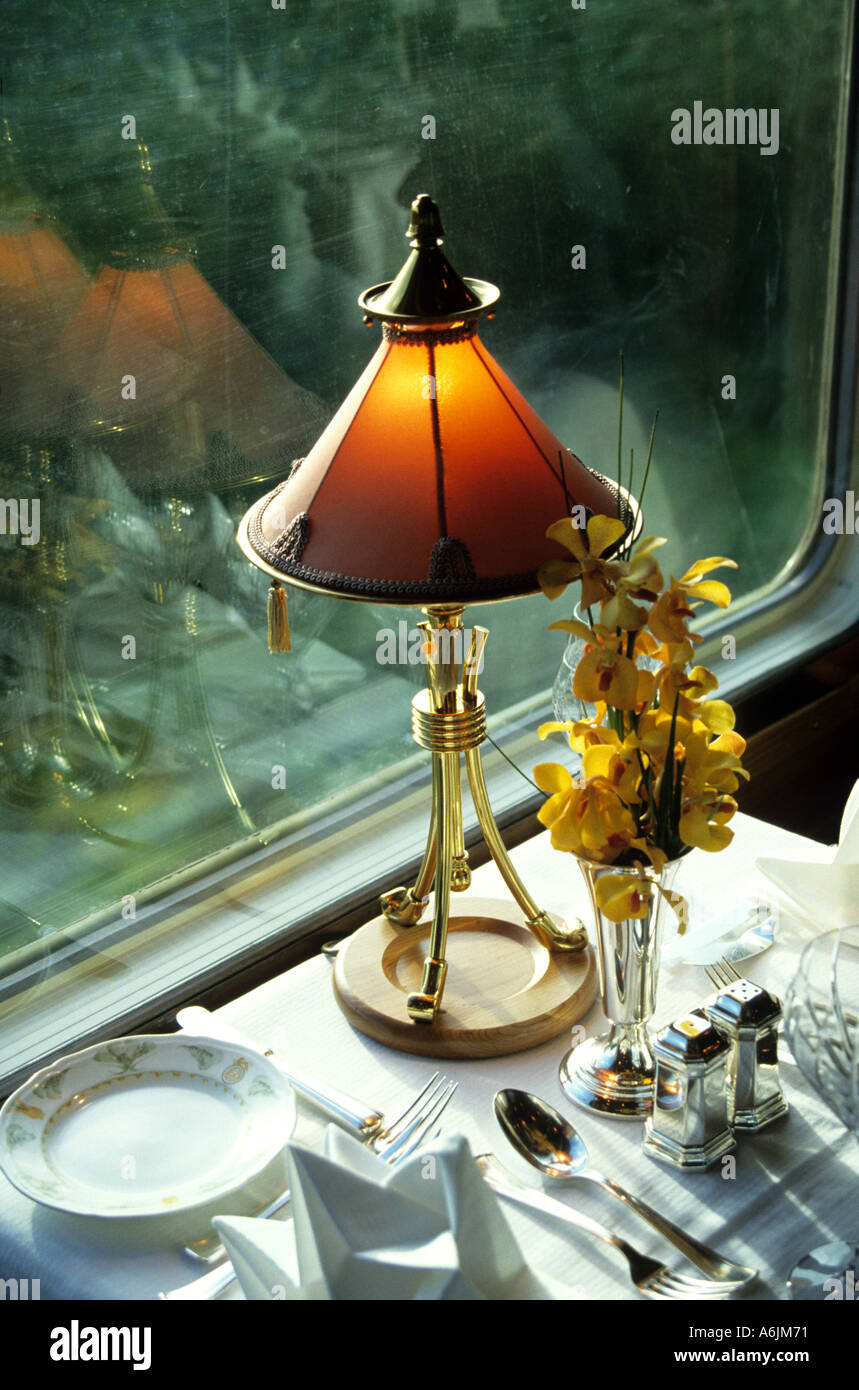 Lamp and table setting in dining car of the Eastern and Oriental Express  Train Stock Photo - Alamy