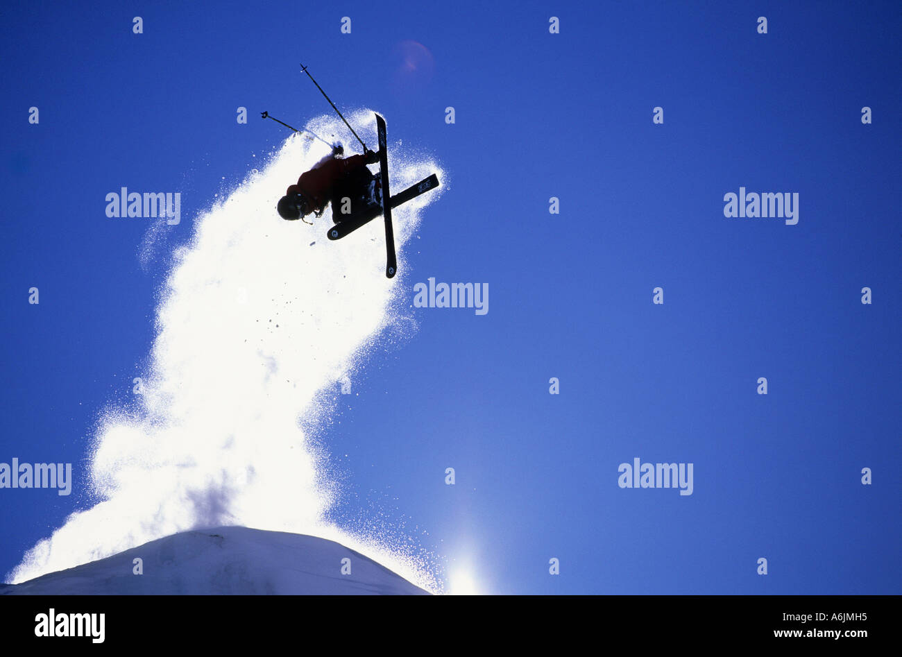 Freeride skier with a plume of snow at  Haines Alaska USA Stock Photo