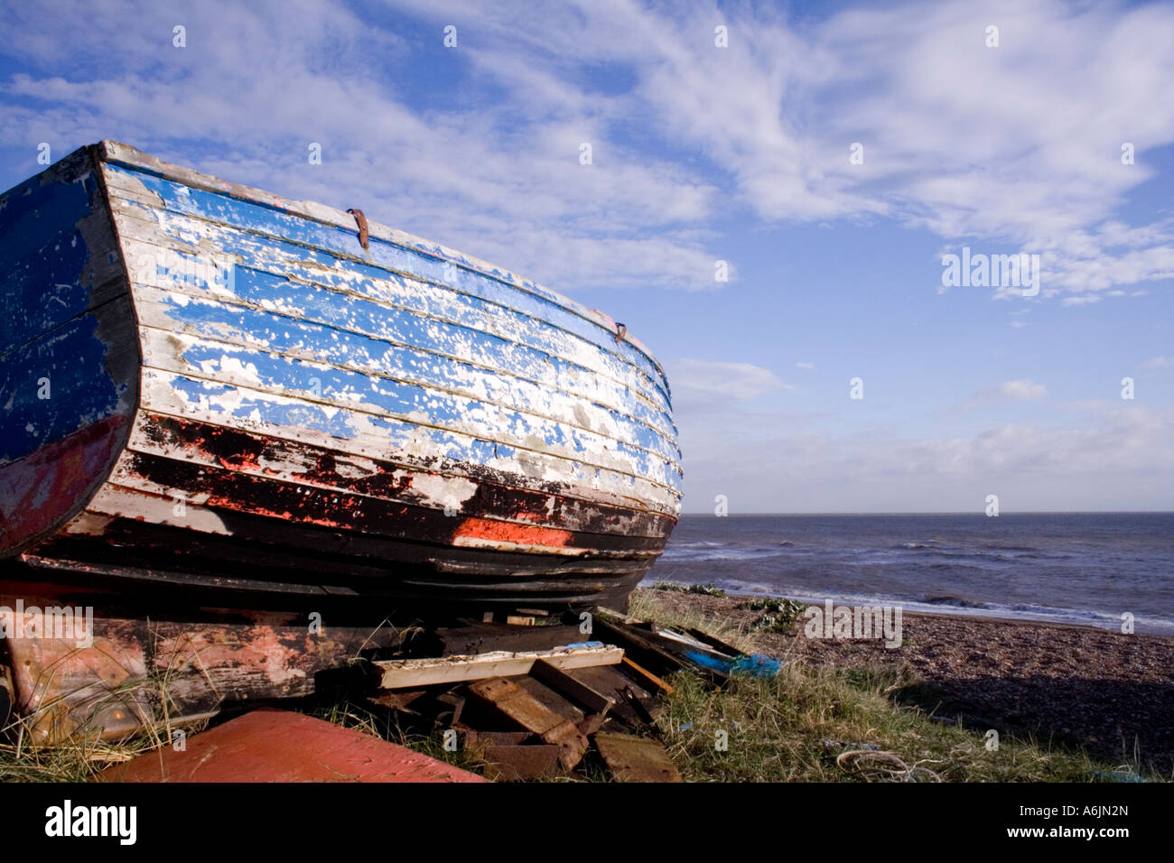 An old boat on the shore Stock Photo - Alamy
