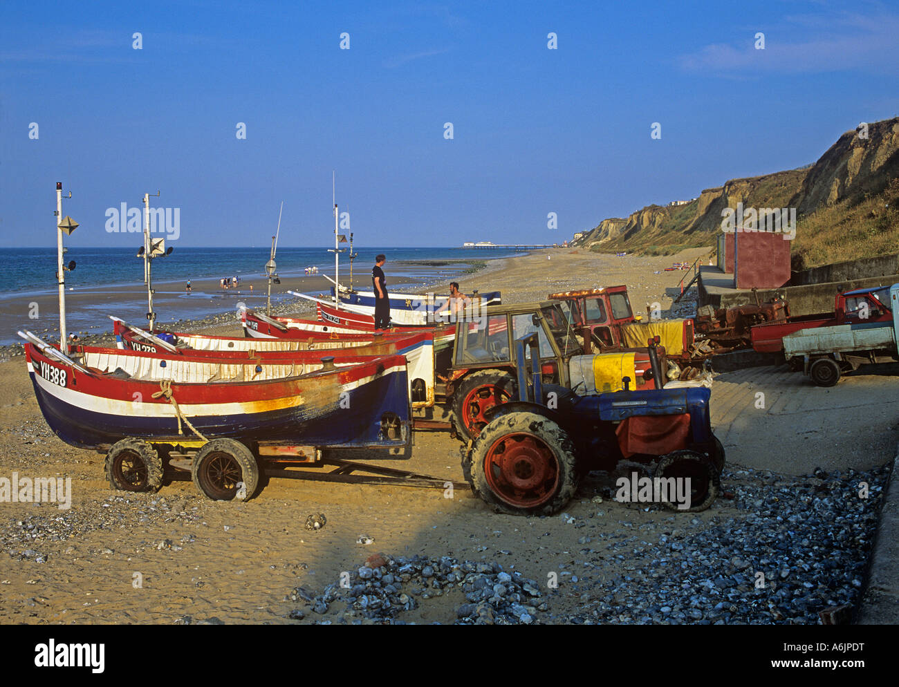 Beach and crab boats by landing ramp at East Runton looking East