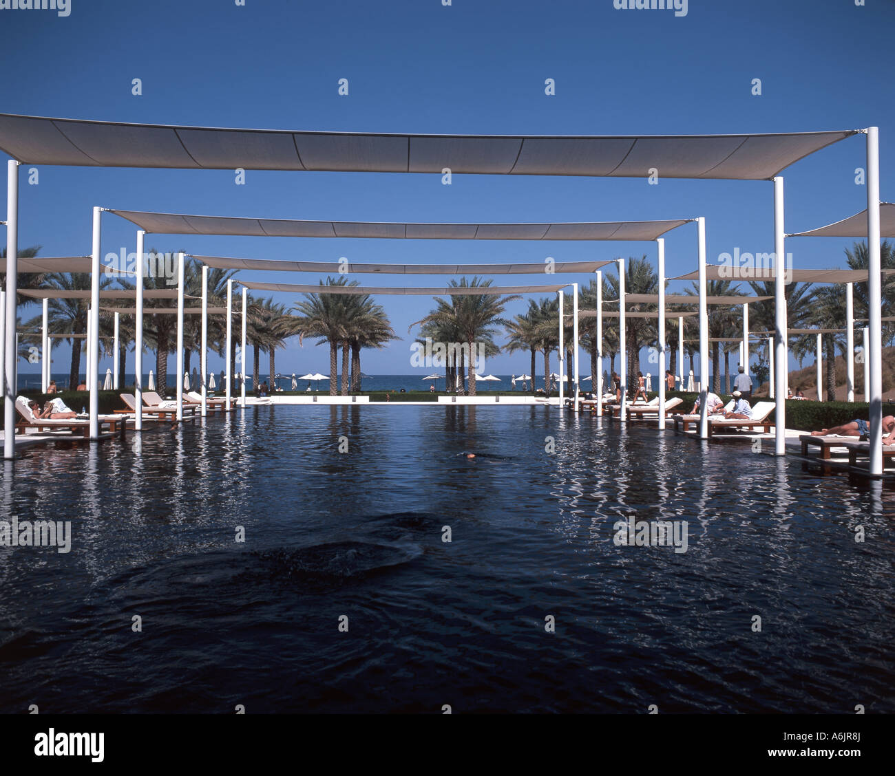 The Chedi Muscat Hotel swimming pool, Chedi, Muscat, Masqat Governorate, Sultanate of Oman Stock Photo