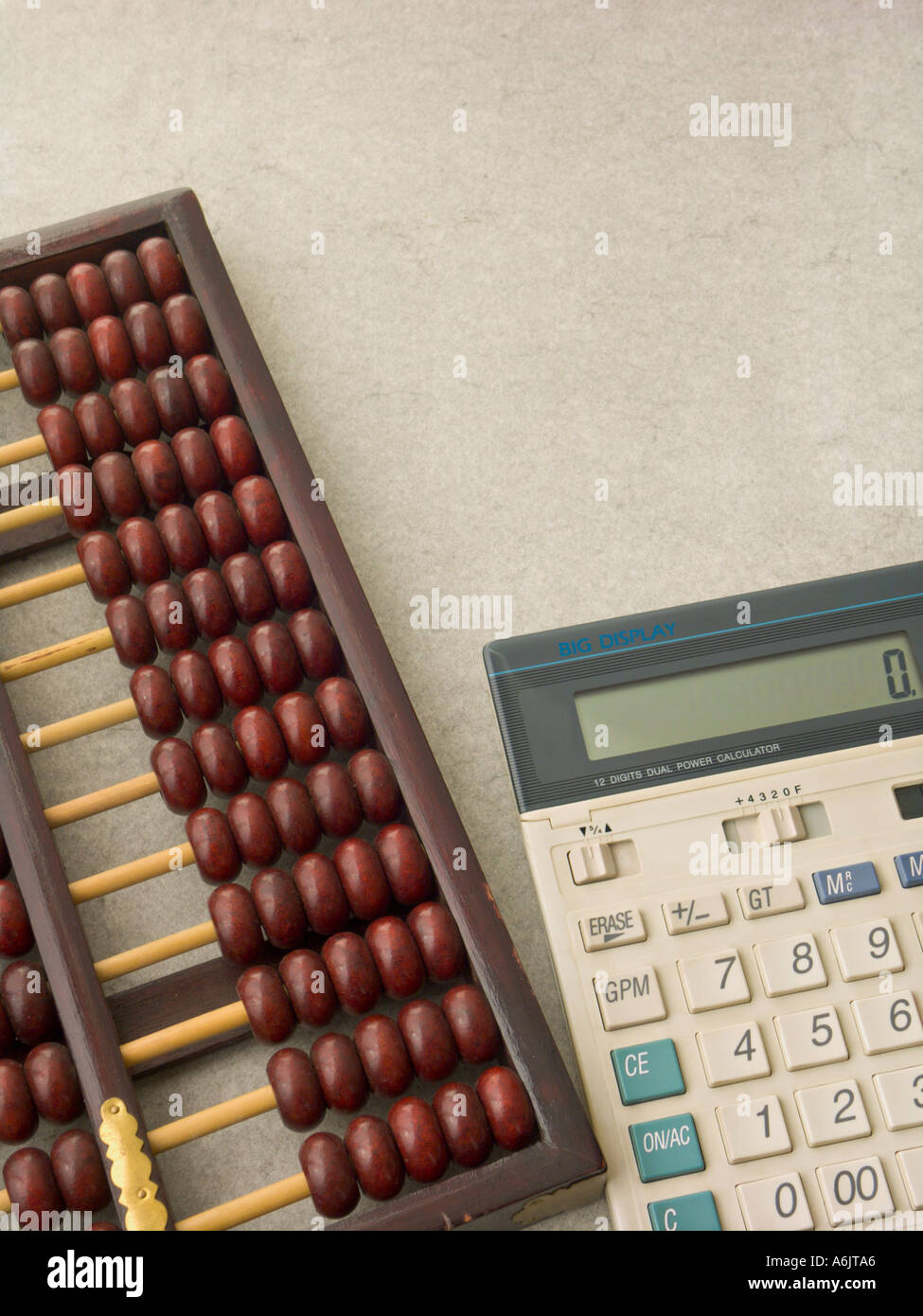 Abacus with modern calculator Stock Photo Alamy