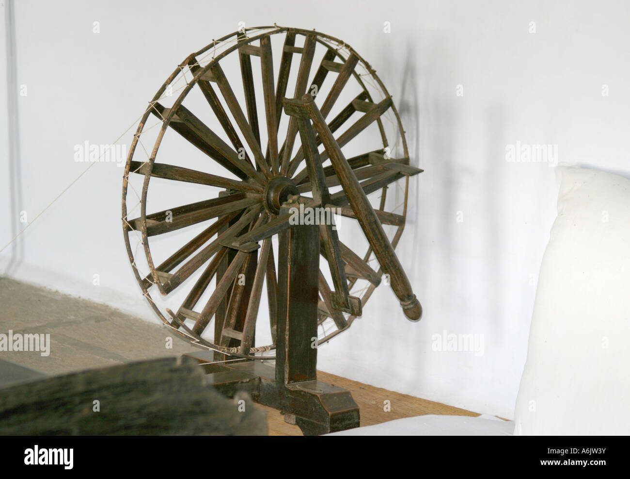 Gandhi's spinning wheel on view at the Sabarmati Ashram  in Ahmedabad, Gujarat, India. Stock Photo