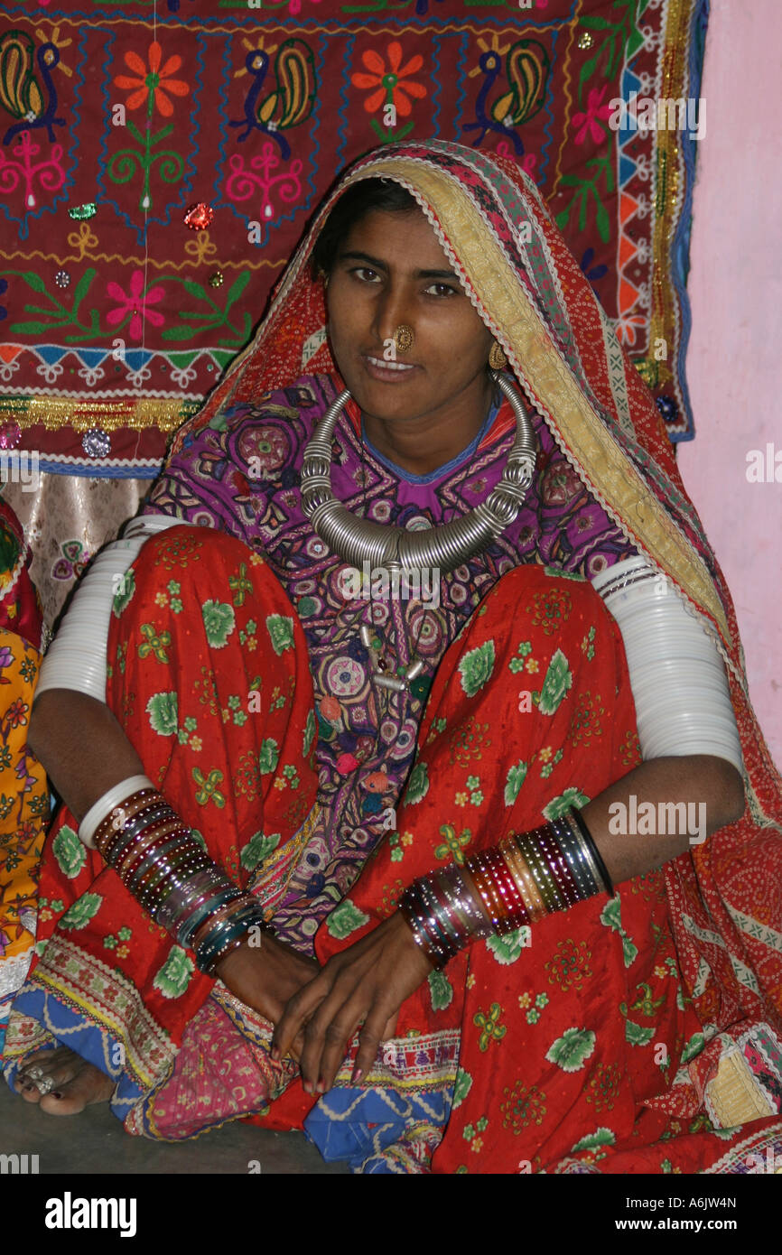 Banni tribal woman wearing her spectacular traditional needlework dress in the little Rann of Kutch, Gujarat India Stock Photo