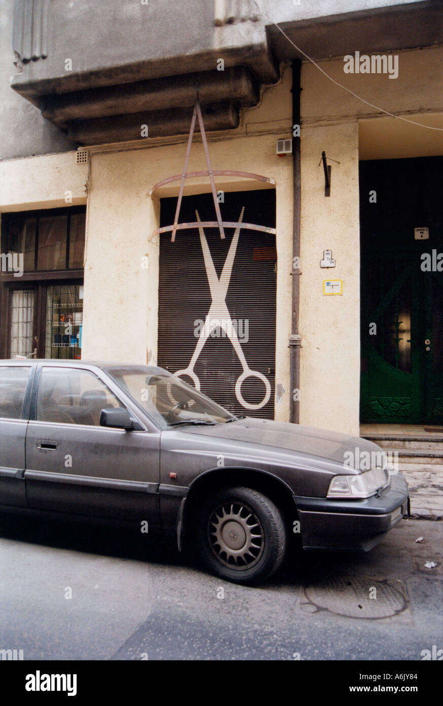 Sissors Logo On Hairdressers Budapest Hungary Eastern Europe Stock