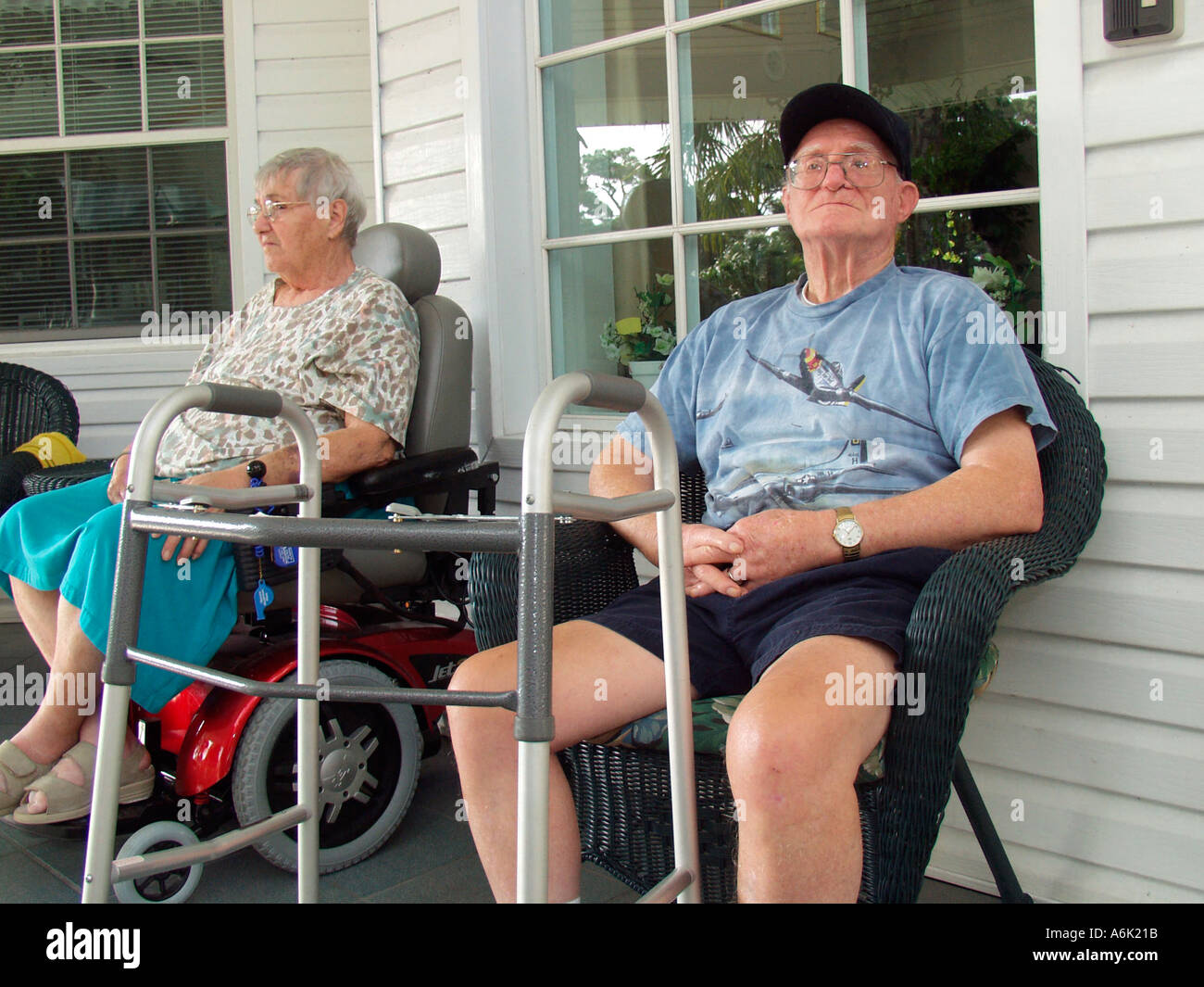 Elderly man and woman sitting on the porch of a nursing home in Florida ...