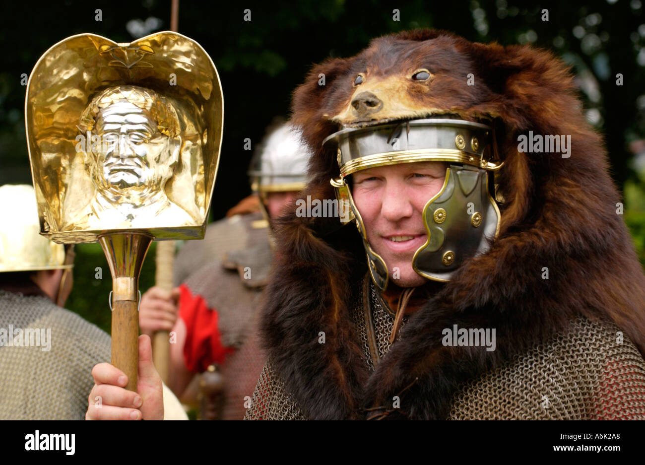 Roman officer carrying the image of Caesar, Ermine Street Guard give a display in the Roman town of Caerleon South Wales UK Stock Photo