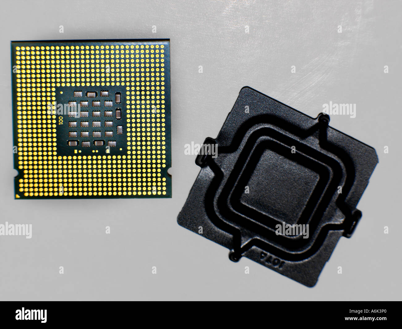 Computer Pentium 4 Chip showing Pads Protective Cover and 775 Socket Stock  Photo - Alamy