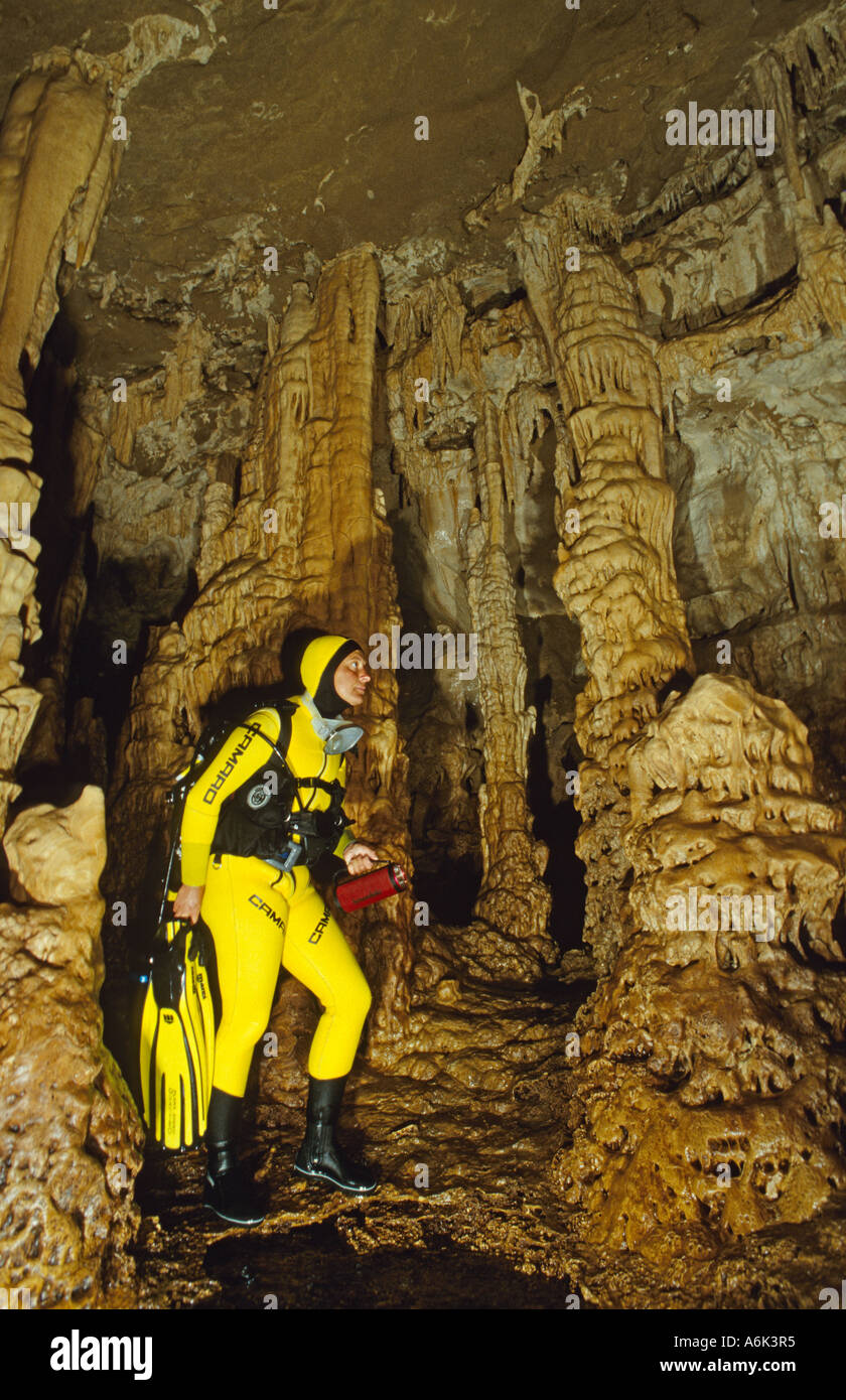 scuba diver in stalactite cave Stock Photo