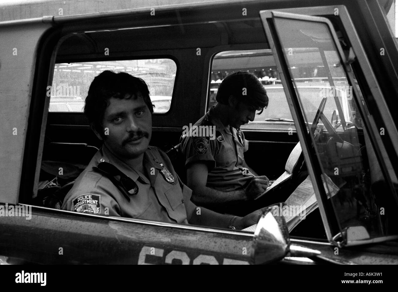 Police patrolling Coney Island, New York, June 1973. Photographed in Black and White. Stock Photo