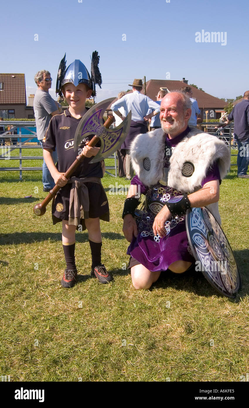 dh County Show KIRKWALL ORKNEY Shetland Jarl squad Viking boy dressed helmet axe Stock Photo