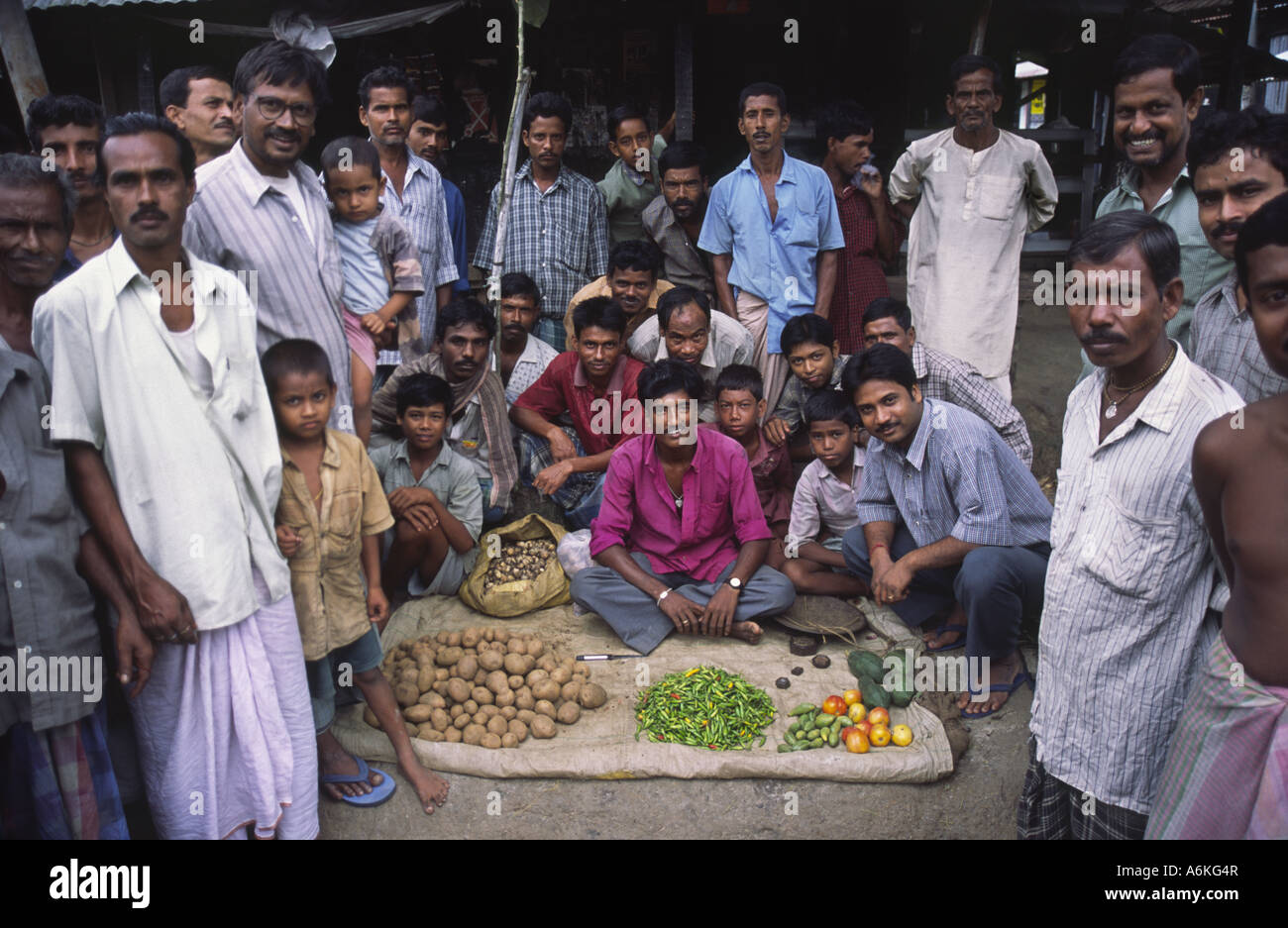 Market traders pose for photograph near Murshidabad, West Bengal, India Stock Photo