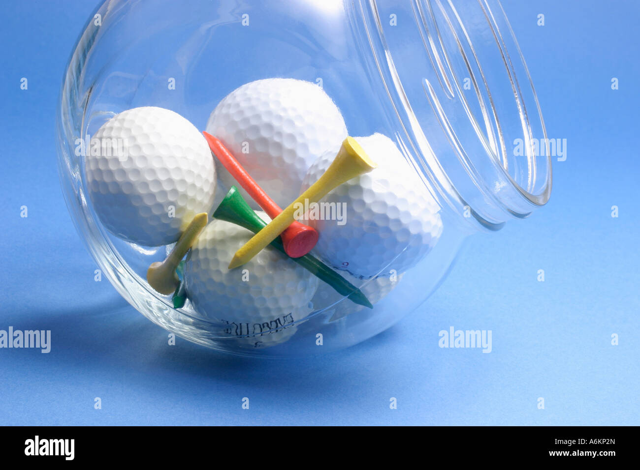 Golf Balls and Tees in Glass Jar Stock Photo - Alamy