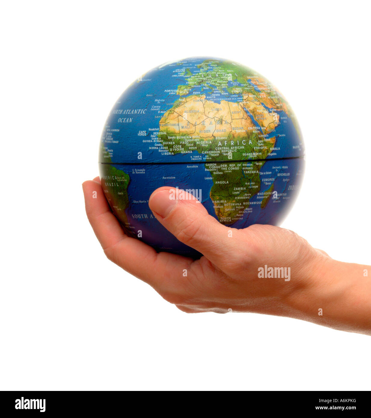 Hand holding a globe Stock Photo