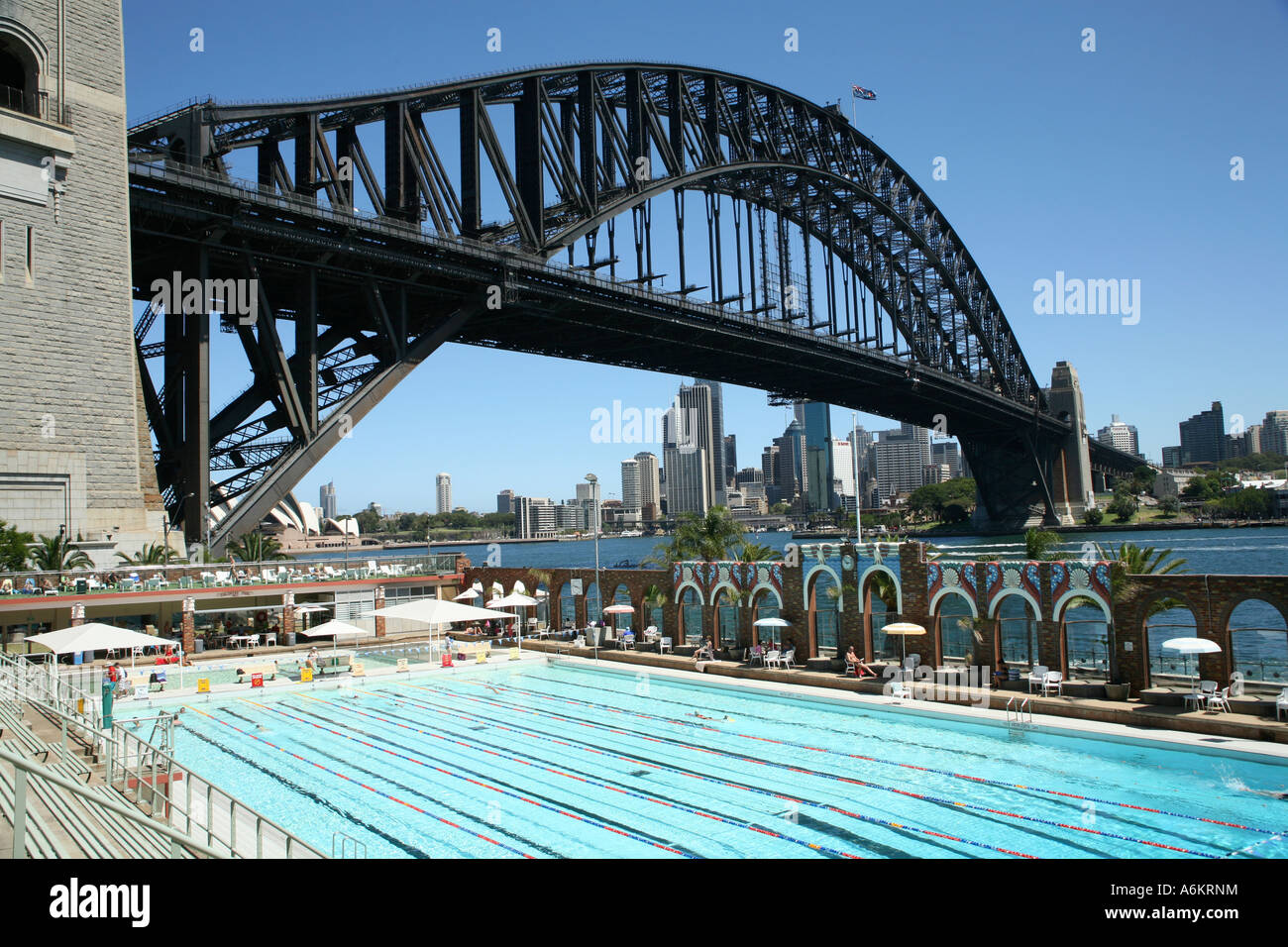 North Sydney Olympic Pool and Harbour Bridge, Sydney, Australia Stock Photo
