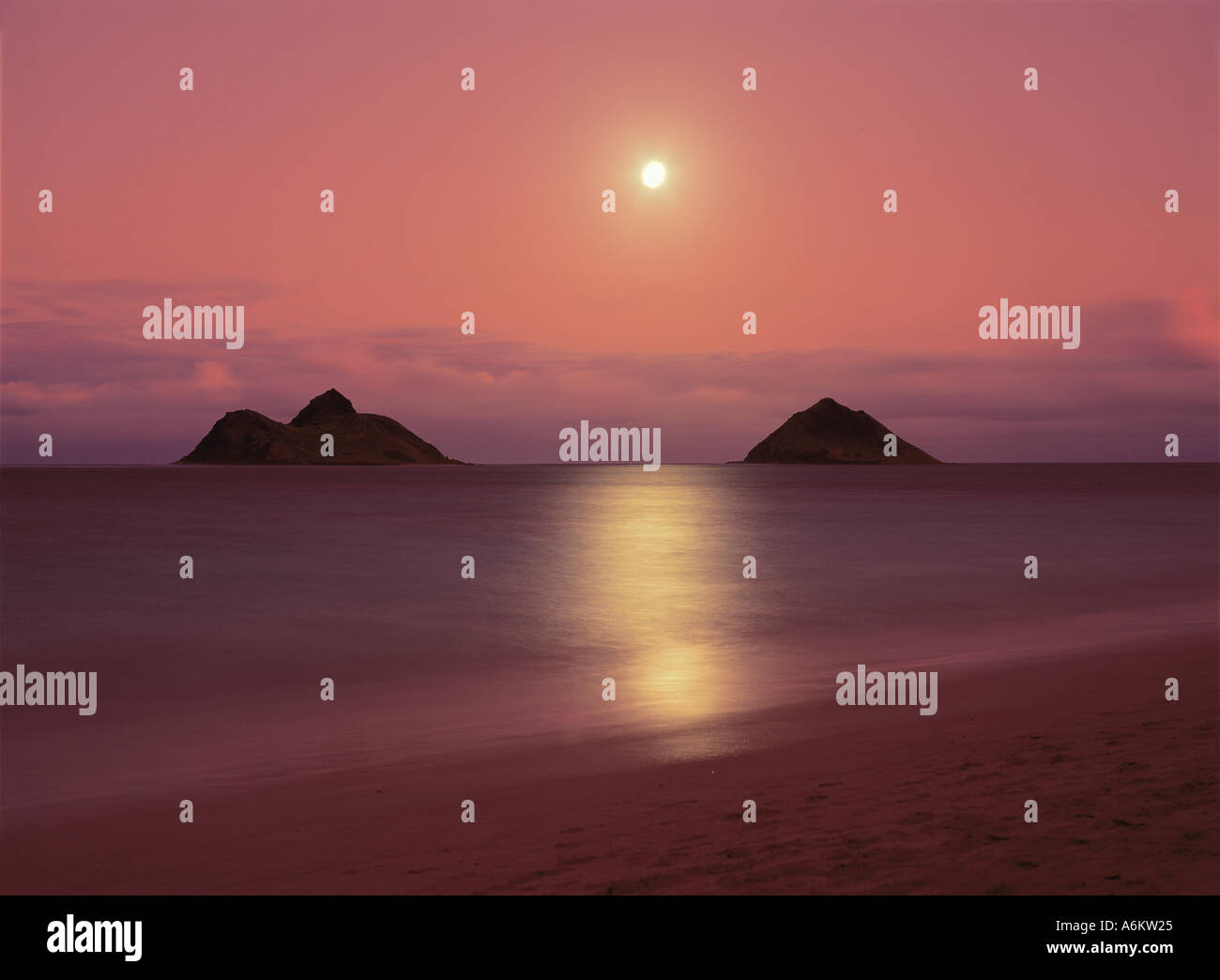 Full Moon rising at Lanikai Beach Oahu Hawaii The moon is rising