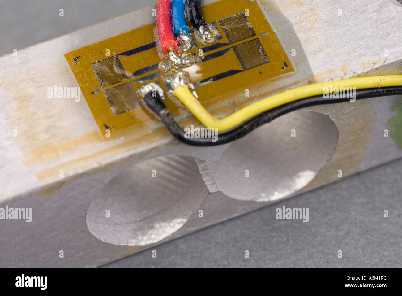 close up strain gauge mounted on a load cell for weighing scales Stock