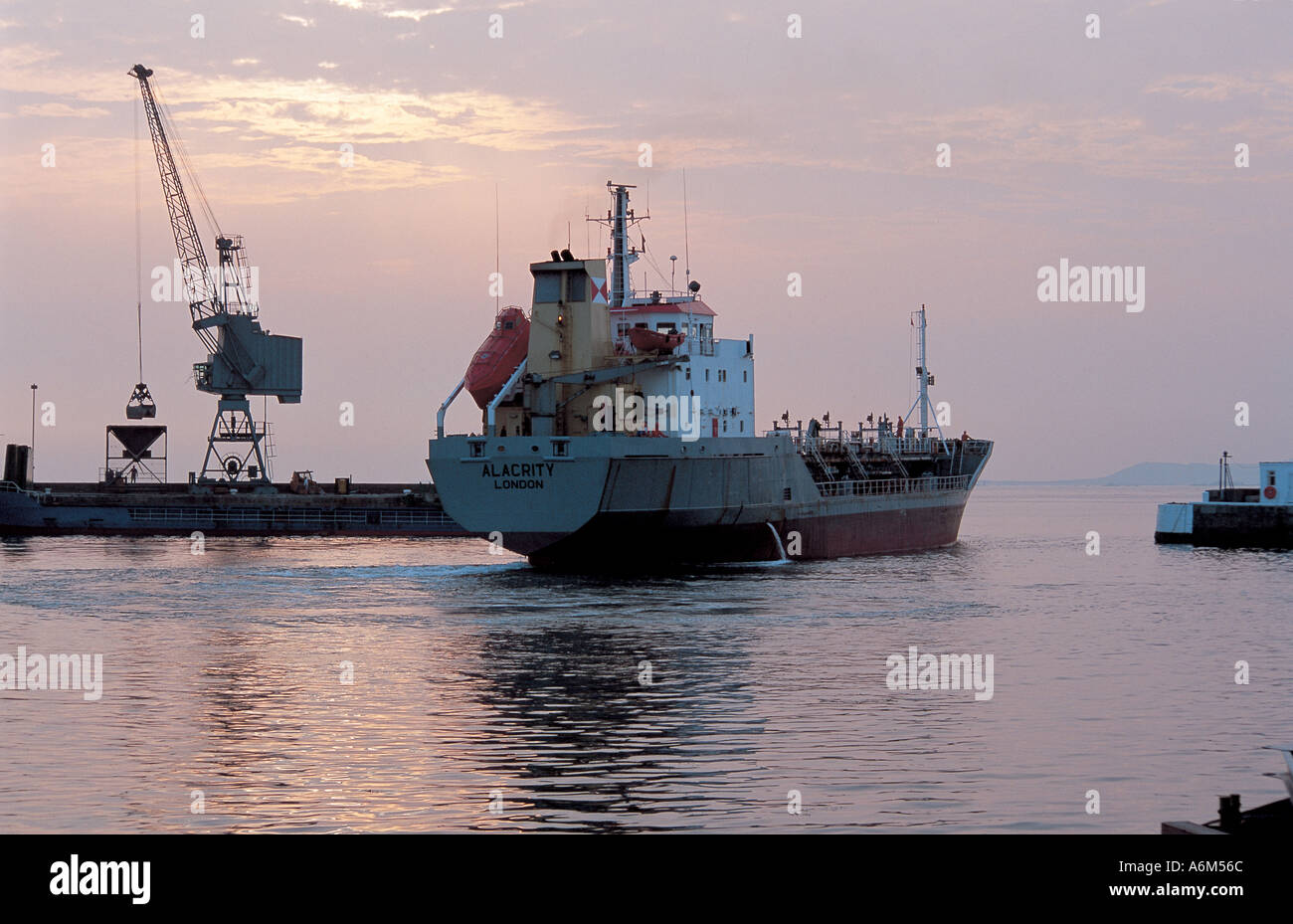The Alacrity Ship leaving St Sampson Port Stock Photo