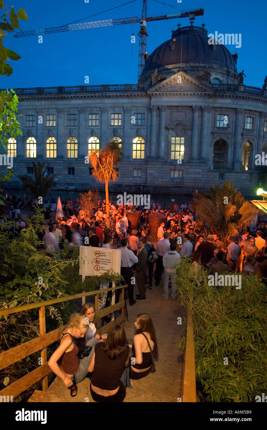 Young people at trendy beach bar in Monbijou park beside the Museum Island Mitte Berlin Germany Stock Photo