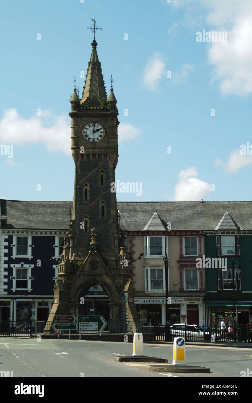 Machynlleth clock tower shops and road junction in town centre Stock