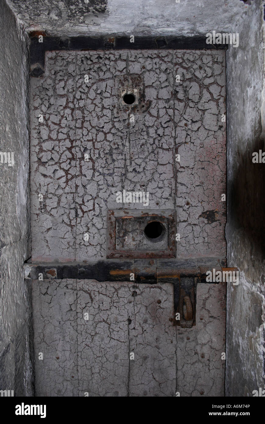 Old And Cracked Prison Cell Door In The Original Wing Of