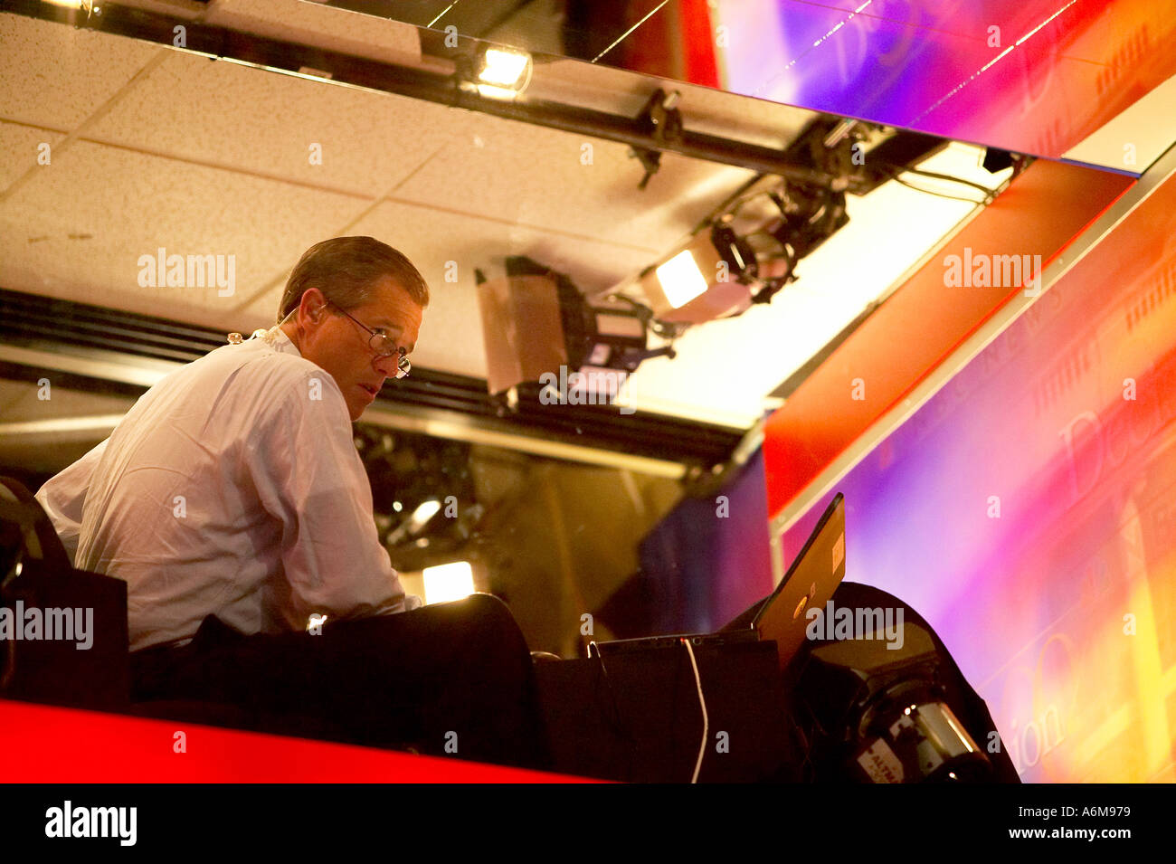 2004 Democratic Convention at the Boston Fleet Center Brian Williams Writing a Story at the 2004 Democratic Convention  Stock Photo