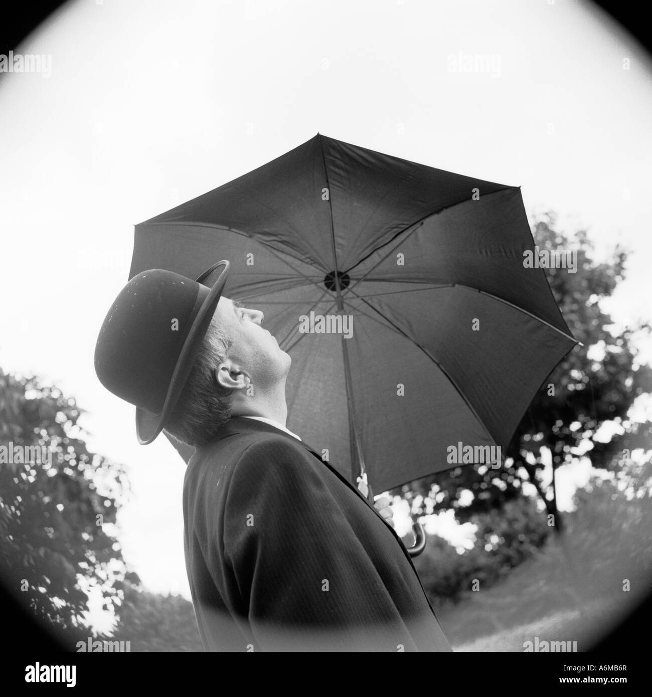 Englishman bowler hat umbrella hi-res stock photography and images - Alamy