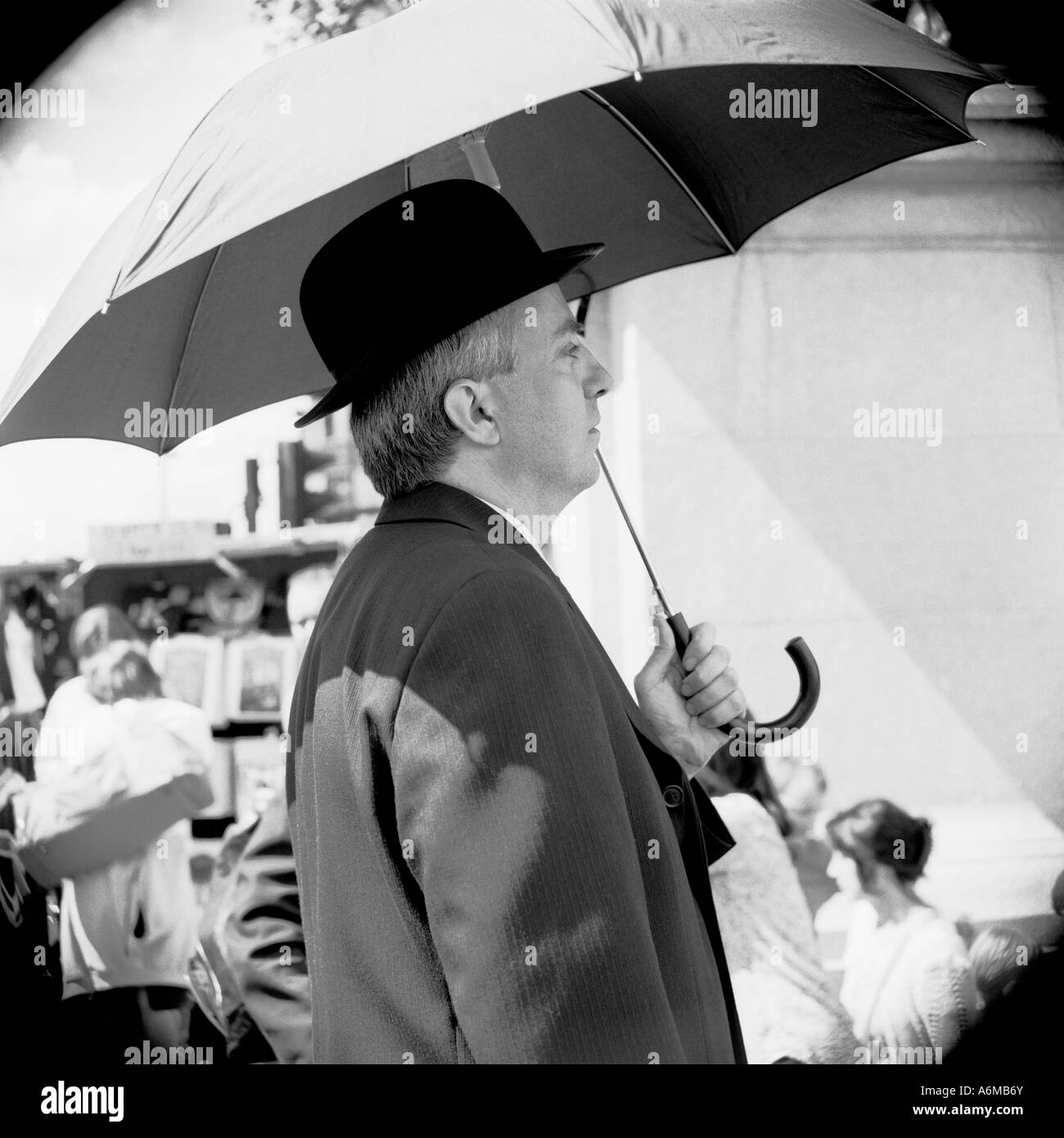 Man bowler hat umbrella Black and White Stock Photos & Images - Alamy