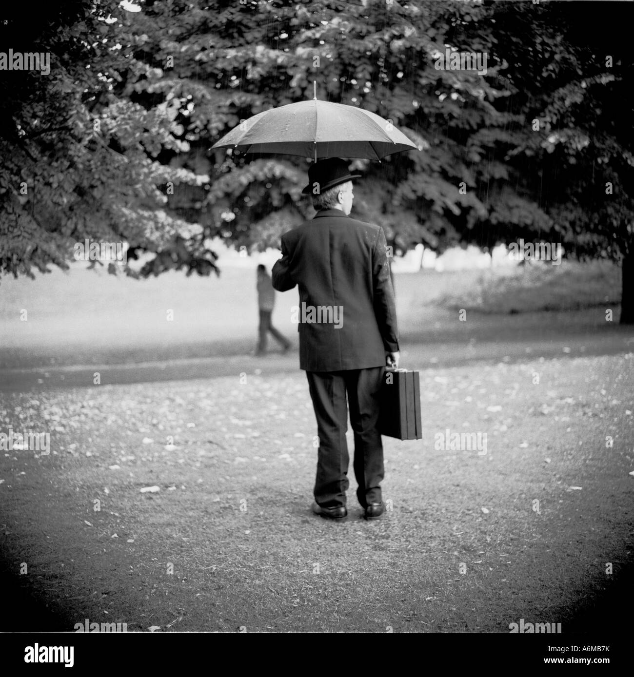 Suit bowler hat briefcase hires stock photography and images Alamy